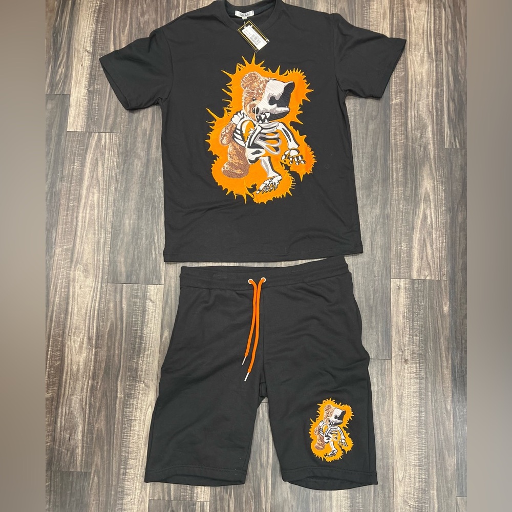 Athletic Black and Orange Short Set with Graphic Design